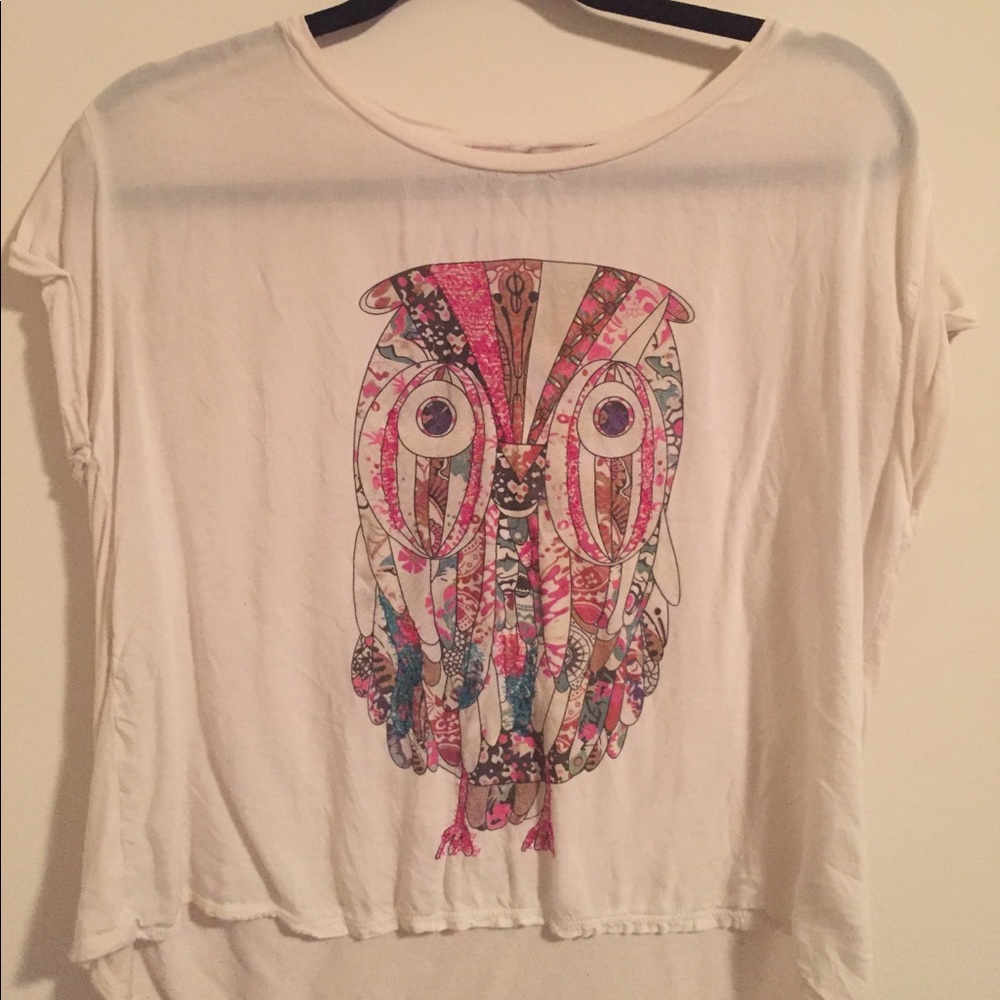 White top with owl print.